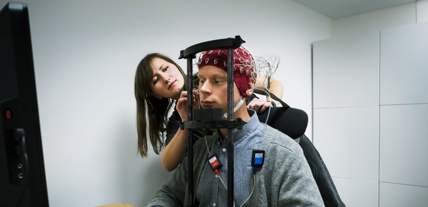 The participant is about to do an experiment that measures the brain responses to auditory stimuli